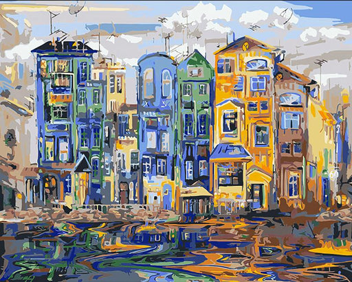 Panoramic view of abstract cityscape wallpaper featuring European-style colorful houses in geometric paint-by-numbers design
