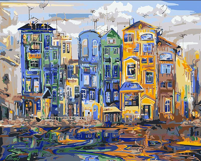 Panoramic view of abstract cityscape wallpaper featuring European-style colorful houses in geometric paint-by-numbers design
