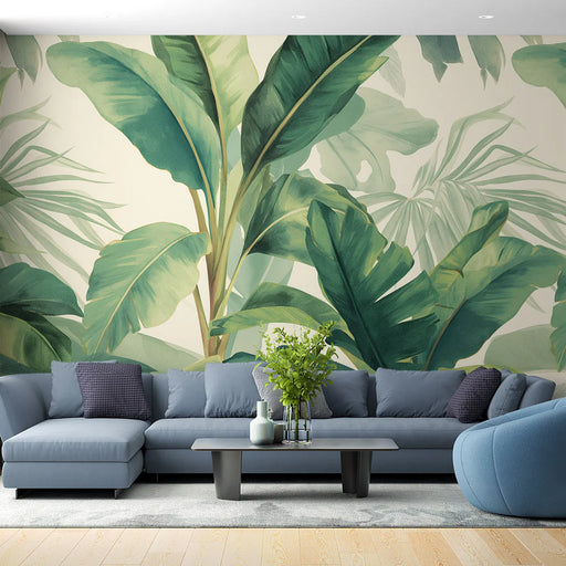 Banana leaves mural wallpaper featuring large tropical foliage in vibrant green and pastel tones for bohemian living room decor


