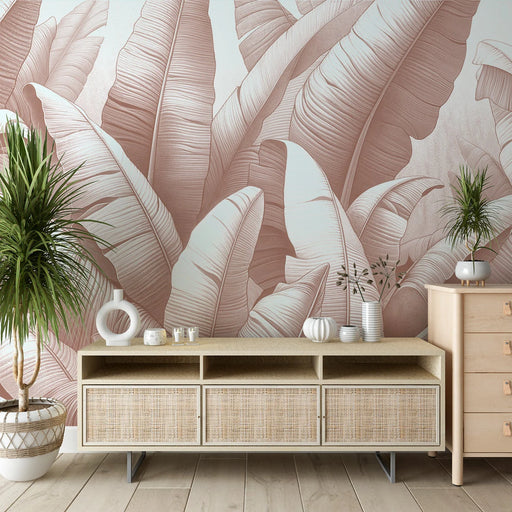 Terracotta pink jungle mural wallpaper featuring large banana leaves in warm terracotta and green tones for tropical living room decor
