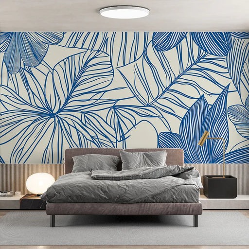Flowers and foliage mural wallpaper featuring delicate blue floral design on light cream background for Scandinavian bedroom decor
