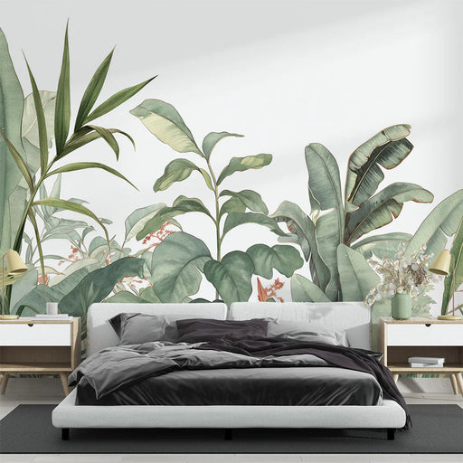 Tropical mural wallpaper featuring lush green vegetation with dense jungle foliage for bohemian living room decoration
