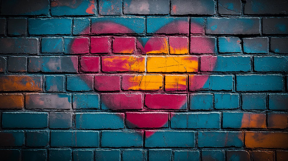 Mural Wallpaper graffiti | Vibrant graphic with a colorful heart on a brick background