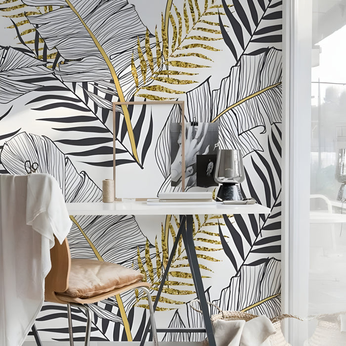 Full wall installation of tropical botanical mural wallpaper with line art foliage and shimmering gold fern details
