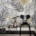 Tropical line art mural wallpaper with black and white palm leaves, banana foliage and gold glitter ferns on white background
